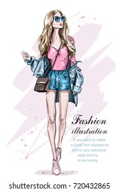 Beautiful young blonde hair woman with bag. Hand drawn fashion girl. Fashion model posing. Sketch. Vector illustration. 