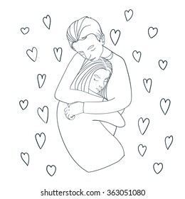 Beautiful young couple in love making a passionate and tender hug.
