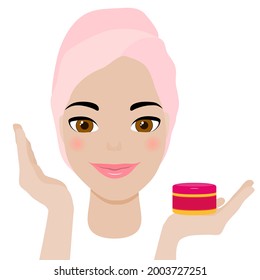 Beautiful young female model shows spa cosmetic product on the open palm of her hand.  The face of a lovely smiling beauty girl with clean fresh healthy skin.  Happy cute fashionable lady