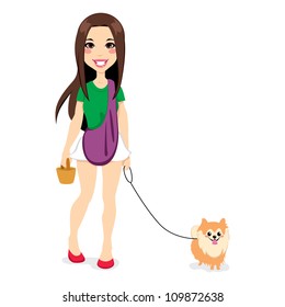 Beautiful young girl walking with cute little pomeranian dog