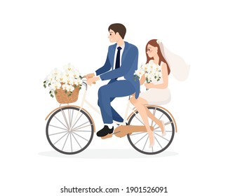 beautiful young just married wedding couple ride bicycle isolated on white background