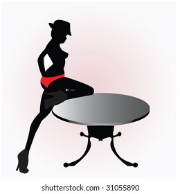 Beautiful young lady dancing on the table
