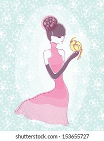 beautiful young oriental girl holding a bird in the hand