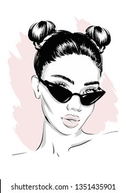 Beautiful young stylish girl in modern sunglasses