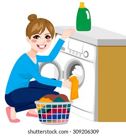 Beautiful Young Woman Doing Laundry Putting Dirty Clothes On Washing Machine From Basket