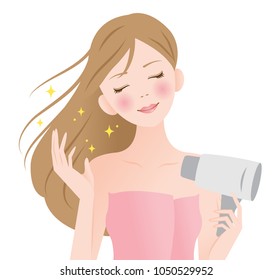 beautiful young woman drying her hair with dryer