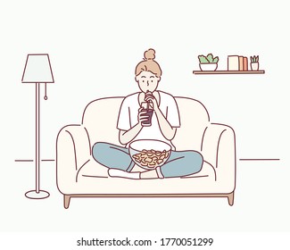 Beautiful young woman eating unhealthy food while watching TV .Hand drawn style vector design illustrations.