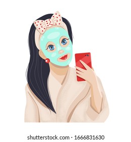 Beautiful young woman with facial mask on her face takes a selfie.