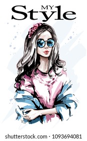 Beautiful young woman portrait. Fashion woman with flower wreath in hair. Cute girl. Sketch. Vector illustration.