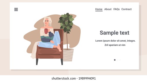 beautiful young woman sitting on armchair girl drinking coffee horizontal