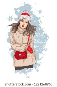 Beautiful young woman in stylish clothes. The girl has Christmas accessories: hat, mittens and bag. Vector illustration with slogan Hello winter! Fashion model posing.