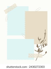 Beautifully arranged scrapbooking layout featuring pastel-colored paper layers in blue and beige hues, adorned with a botanical twig and secured with paper clips. The design exudes a subtle charm