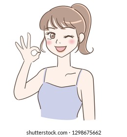 Beauty care young woman. Smiling and showing OK sign .