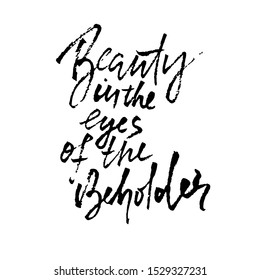 Beauty is in the eye of the beholder. Hand drawn lettering proverb. Vector typography design. Handwritten inscription.