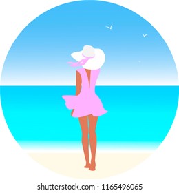 Beauty girl walking along the beach. A relaxed woman on the beach.