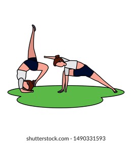 beauty girls couple practicing pilates in grass