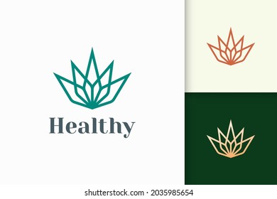 Beauty or health logo in flower shape fit for vitamin or serum product