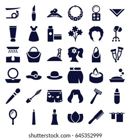 Beauty icons set. set of 36 beauty filled icons such as comb, mirror, cream tube, straight hair, hair removal, lipstick, nail, powder, woman face with flower in hair