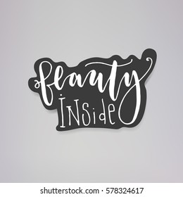 "Beauty inside" - vector illustration design of modern badge with text isolated on black background. Creative sticker design.