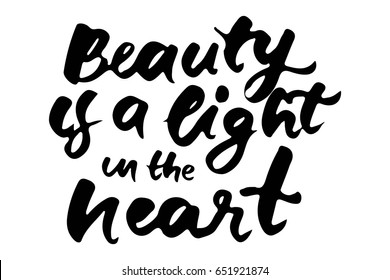 beauty is a light in the heart. Modern calligraphic style. Hand lettering and custom typography for your designs: t-shirts, bags, for posters, invitations, cards, etc.