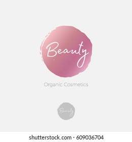 Beauty  logo. Cosmetic emblem. Letters on a pink circle.