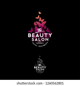 Beauty Salon logo. Watercolor Butterflies silhouettes isolated on a dark background. The vintage style.