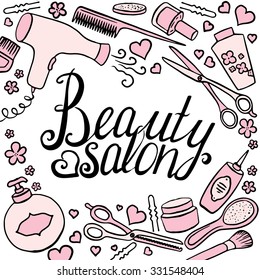 Beauty salon vector lettering surrounded by hairdresser's tools in pink tones