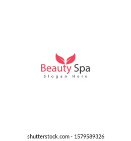 beauty spa logo with a two leaf shape on top of the logo name and color that makes this design unique, modern, simple.