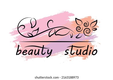 Beauty studio. Black letters handwritten logo on a pink innuendo pastel background with floral elements. Stylish logotype for the beauty business, studio, salon. Vector illustration. Fashion. Luxury.