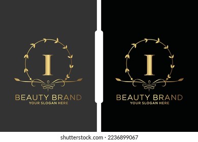 I Beauty vector initial logo, Golden floral letters with flowers leaves and gold splatters isolated on white background. Vector illustration for wedding, greeting cards, invitations template design