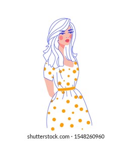 Beautyful young woman  in stylish polka dot dress