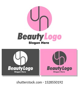 Beauty,Pink,Letter U,Letter N Logo Template with Circle Shape Vector for Business