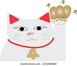 A beckoning cat holding an oval