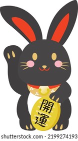 Beckoning cat of the rabbit with the oval gold coin and Japanese letter. Translation : "Good luck"