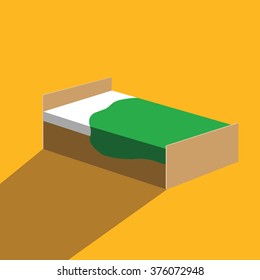 Bed with a green cover on a brown background