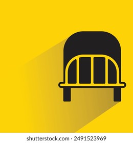 bed icon with shadow on yellow background