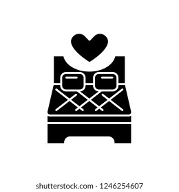 Bed for lovers black icon, vector sign on isolated background. Bed for lovers concept symbol, illustration 