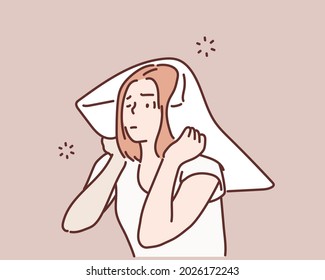 Bed woman covering ears with pillow. Hand drawn style vector design illustrations.