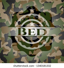 Bed written on a camouflage texture