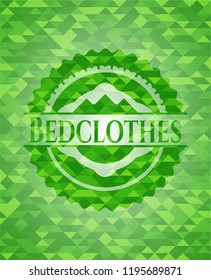 Bedclothes green emblem. Mosaic background