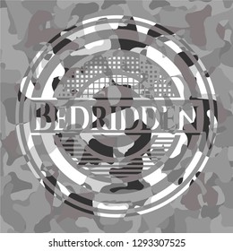 Bedridden on grey camouflaged texture