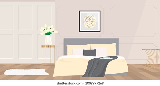 Bedroom with a bed in pale yellow tones