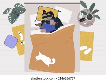 A bedroom morning scene, a young lesbian couple spooning in bed with their pets, a dog and a cat