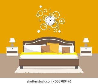 Bedroom in an orange color. There is a bed with pillows, bedside tables, a big round clock on the wall, lamps and other objects in the picture. Vector flat illustration