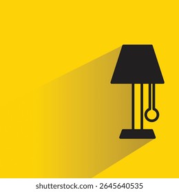ícone de lâmpada de cabeceira com sombra sobre fundo amarelo
