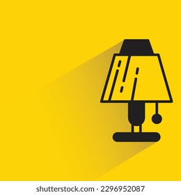 bedside lamp with shadow on yellow background