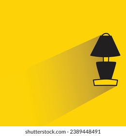 bedside lamp with shadow on yellow background