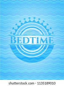 Bedtime light blue water wave style badge.