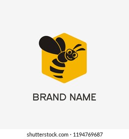 Bee cartoon on yellow hexagonal shape