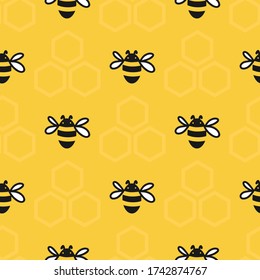 Bee with honeycombs seamless pattern on a yellow background.  Vector illustration. 